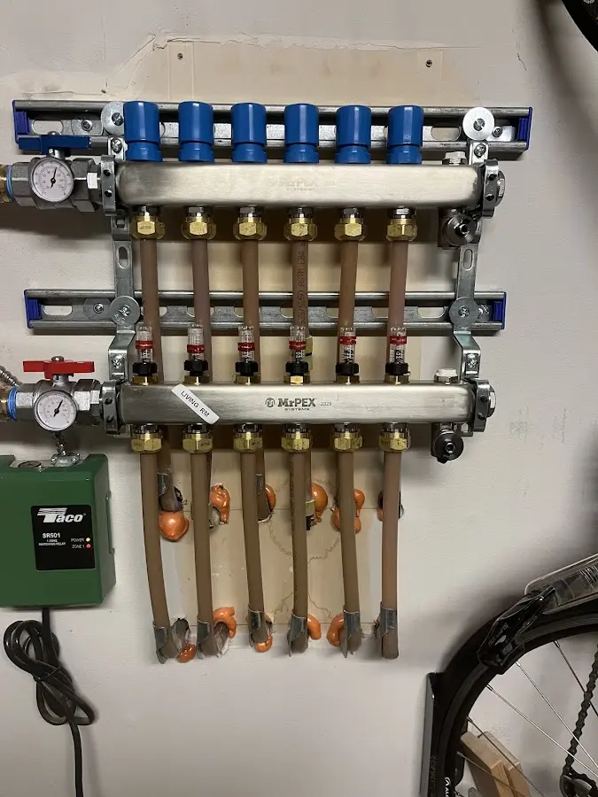 Plumber performing Water Heater Repair at a residential property in Temple